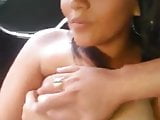 asian play with tits in the car